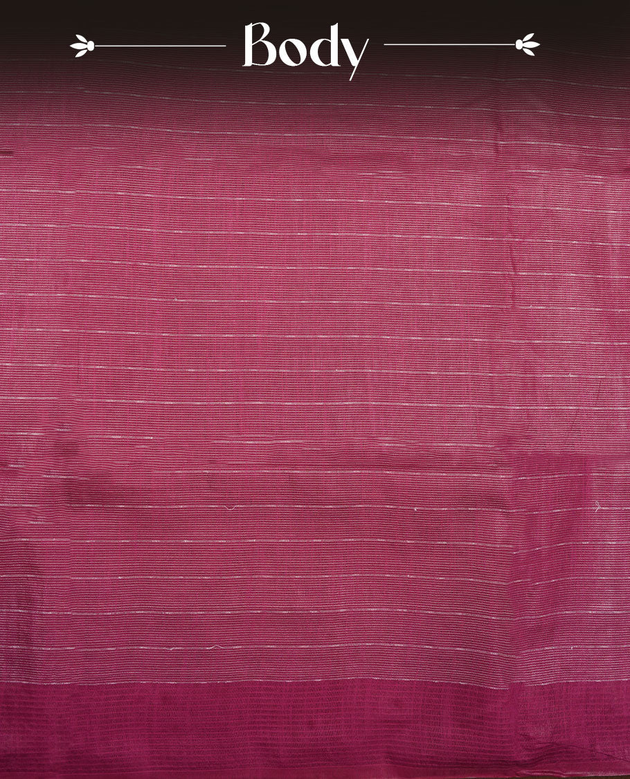 Burgundy colour semi jute saree highlighting gold zari striped body, without border and paired with matching blouse.