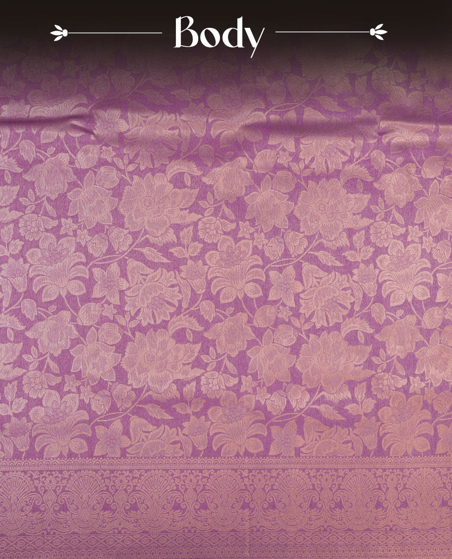 Lavender Purple colour semi soft silk brocade saree featuring elegant floral woven motifs across the body, finished with a self colour ornate border and pallu, paired with a matching blouse.