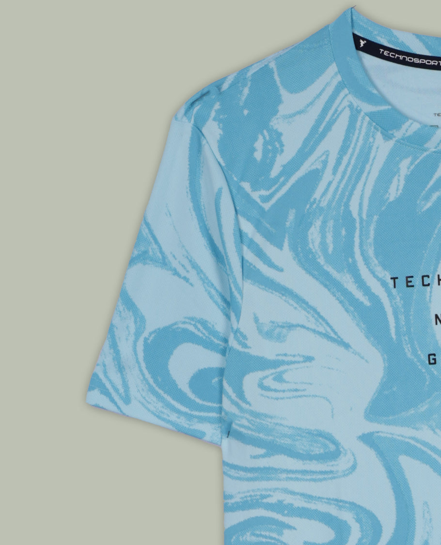 Sky blue colour T shirt featuring a subtle self print design, comfortable short sleeves, and a classic round neck for a casual, stylish look.