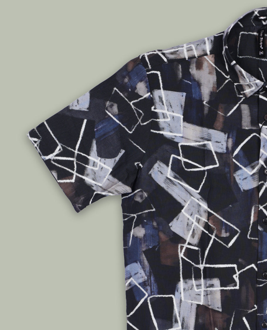 Deep green colour shirt features an abstract geometric print in white, grey, brown, and blue tones & Designed with short sleeves and a button down front,it blends contemporary style with subtle detailing.