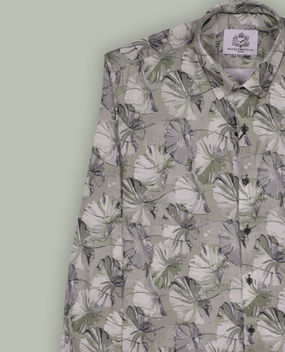 Beige colour shirt adorned with soft green & cream colour floral prints, Designed with a classic collar and full sleeves, this timeless piece offers a crisp and casual look, perfect for both work and weekend wear.