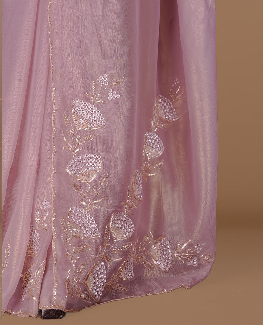 Pastel Pink colour net organza saree featuring thread, sequins, cut beats worked on body, highlighting scalp border, paired with matching blouse piece.