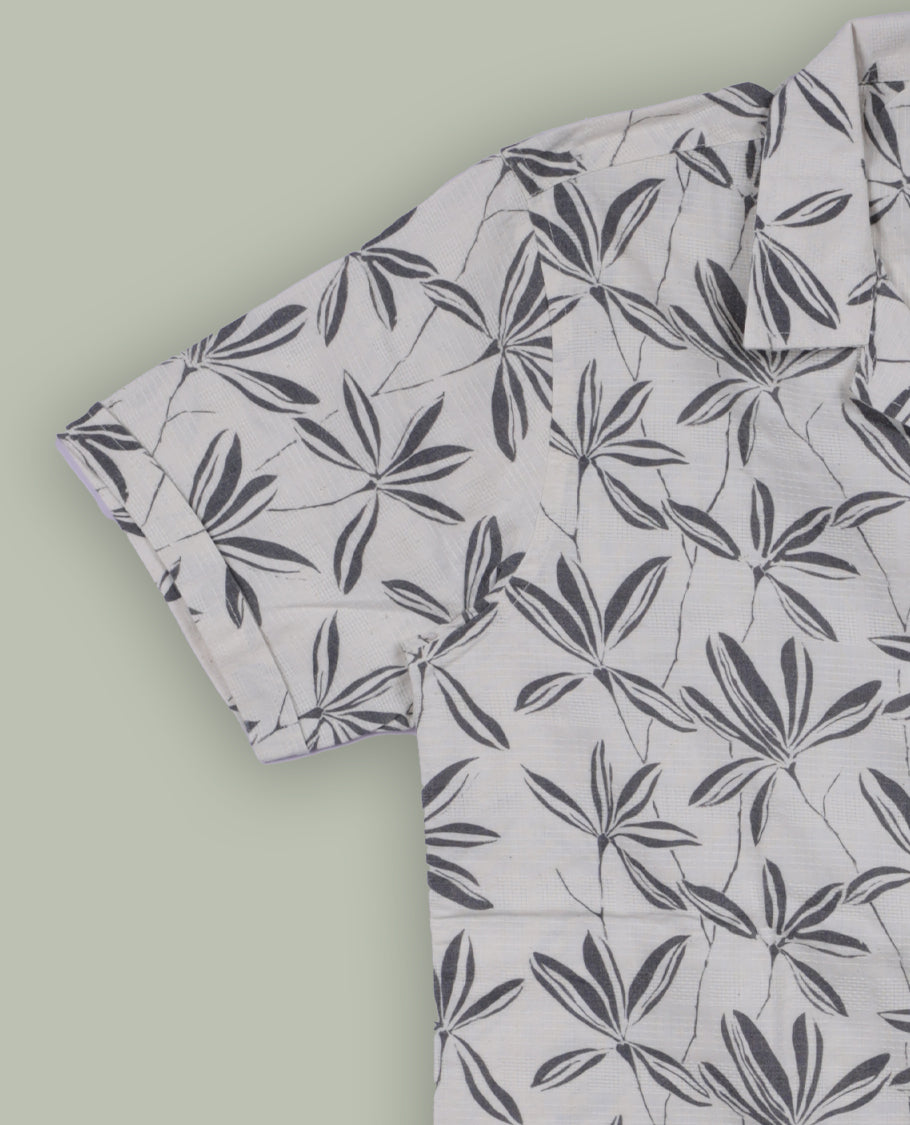 Off white colour short sleeve shirt features a rounded spread collar and a grey colour jacquard print all over & its ideal for both casual days and laid back evenings.
