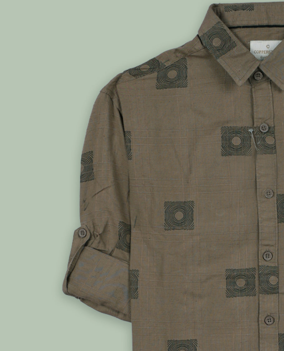 Pastel brown colour shirt featuring a modern geometric square print and subtle grid texture, Designed with full sleeves and a chest pocket & its ideal for both casual days and laid back evenings.