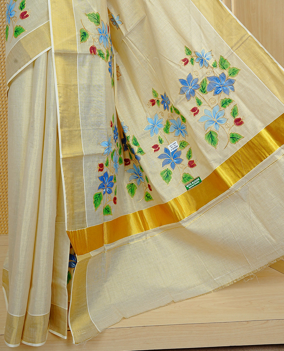 Cream colour Tissue kerala saree featuring Embroidery buttas on body, complemented by Floral thread work with Print & kasavu kara, comes with matching blouse piece.