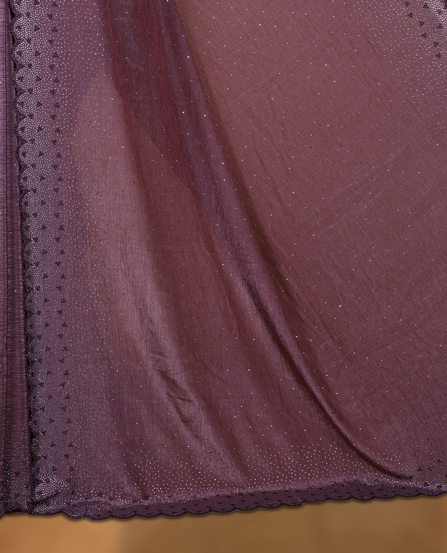Grape colour chiffon designer saree, featuring black and white scattered stone on body, stone work and heavy stone pattern on border and pallu, Paired with matching blouse.
