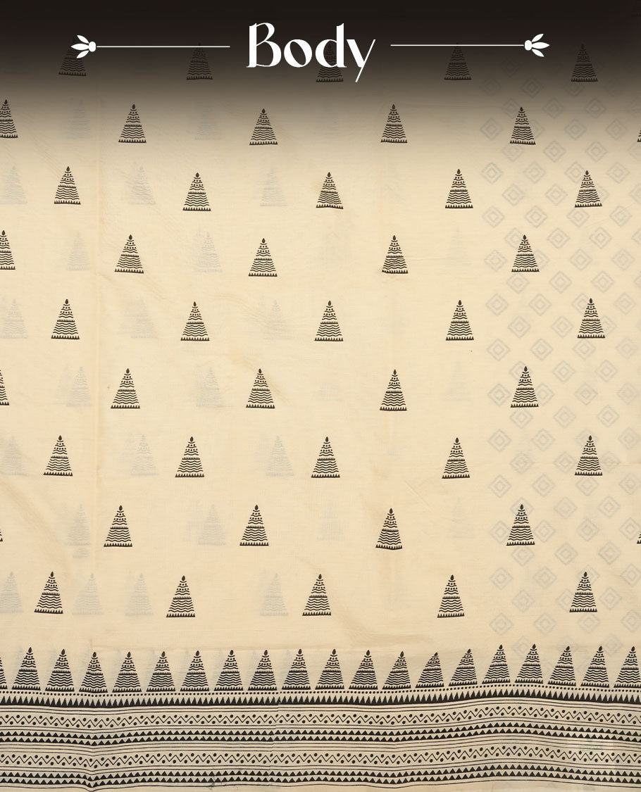 Cream colour poly cotton saree with black temple motifs on the body, paired with a matching with black woven traditional border, and a coordinated all‑over geometric printed blouse piece.