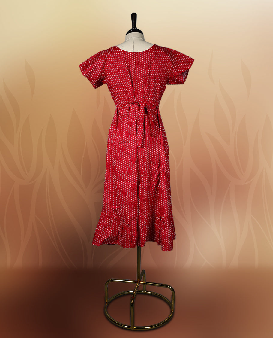 Red colour nightwear with tiny off white colour circles, V neckline, and flutter sleeves & The flared hem with pleats adds a chic touch, Ideal for casual wear, office looks, or relaxed outings with a stylish twist.