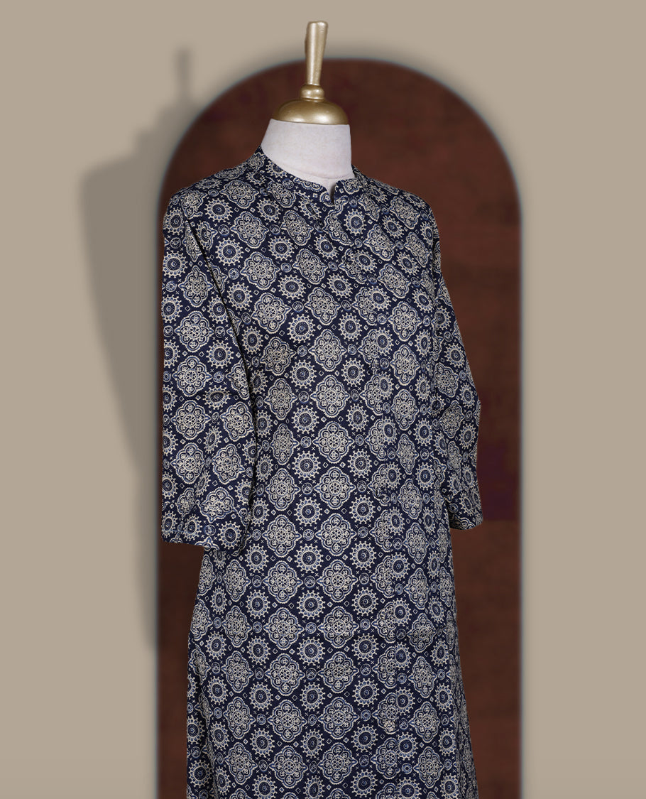 Navy blue colour coord set with floral prints all over, featuring a smart mandarin collar and 3/4 sleeves, Paired with matching straight pants, it blends elegance and comfort for a chic everyday or casual outing look.