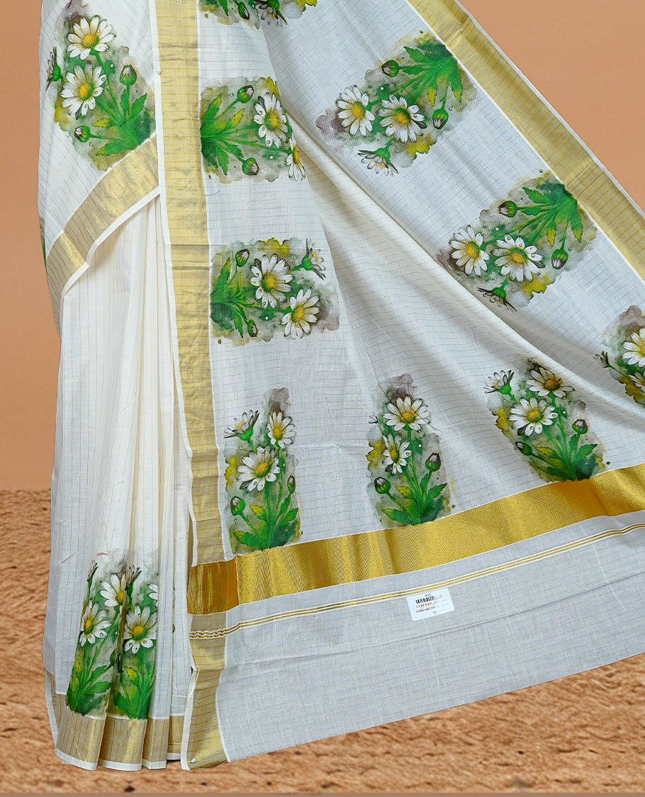 Cream Color Kerala Saree Featuring Gold Zari Stiprs On Body, Enrich Gold Zari With Floral Printed Border & Pallu, Paired With Matching Blouse Piece.