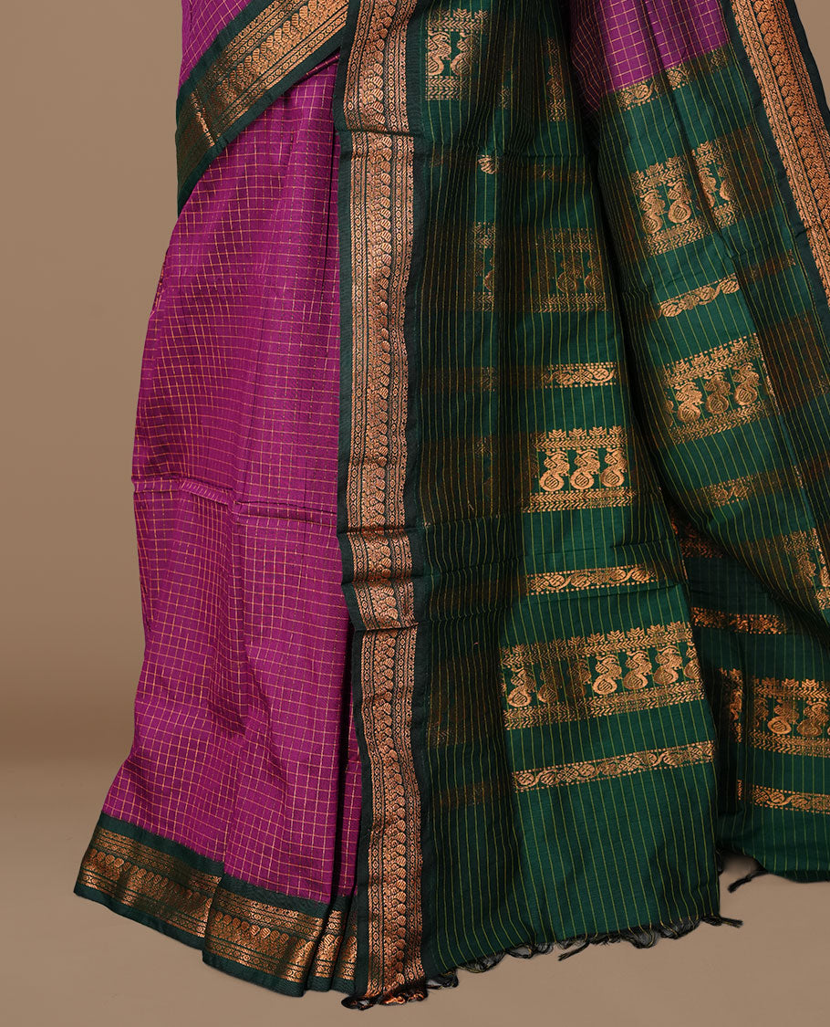 Purple colour kalyani cotton saree featuring gold zari check pattern on body, complemented by green colour with Antique zari border, paired with matching blouse piece.