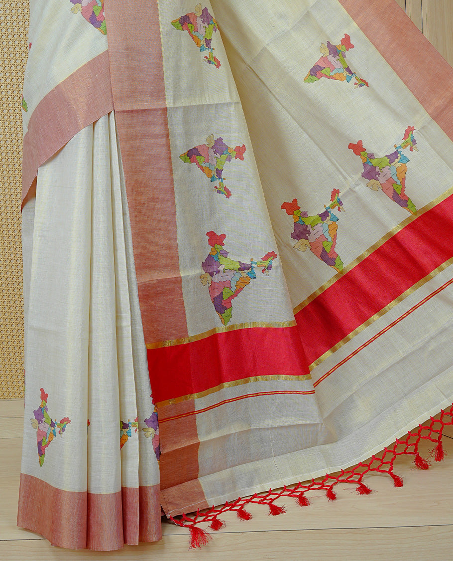 Cream Colour Kerala Saree Featuring Plain Body ,Complemented By A Red Zari With Indian Map Border ,Enhance By A Gold Zari & Red Pallu ,Paired With A Matching Blouse Piece.