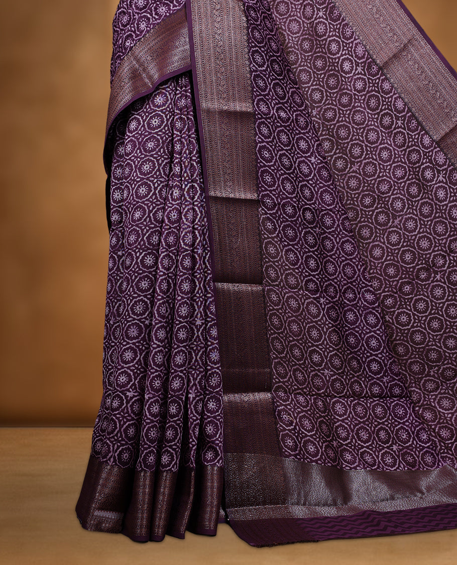 Purple colour chanderi silk saree with Floral block print On body, compilmented by self colour border with antique zari pattern and a matching blouse.