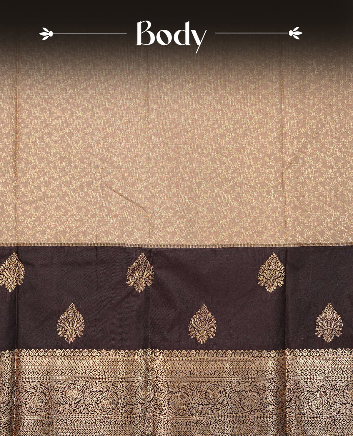 Light mocha colour semi wedding saree featuring gold zari motifs across the body, complemented by contrast Chocolate brown colour traditional border. Comes with a matching blouse piece.