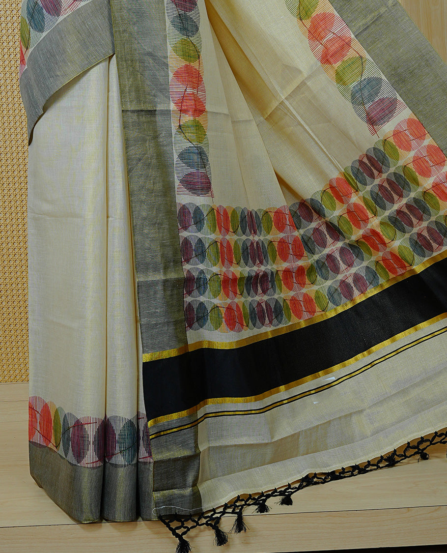 Cream Colour Tissue Kerala Saree Featuring Multicolour Circular Prints Along The Border And Pallu, Complemented By A Black Border With Traditional Gold Zari Accents, Paired With A Matching Blouse Piece.