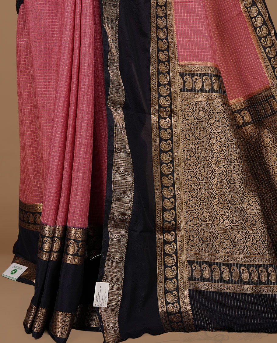 Mauve colour semi georgette saree featuring gold zari check pattern on body, complemented by contrast Black colour with zari border, paired with matching blouse piece.