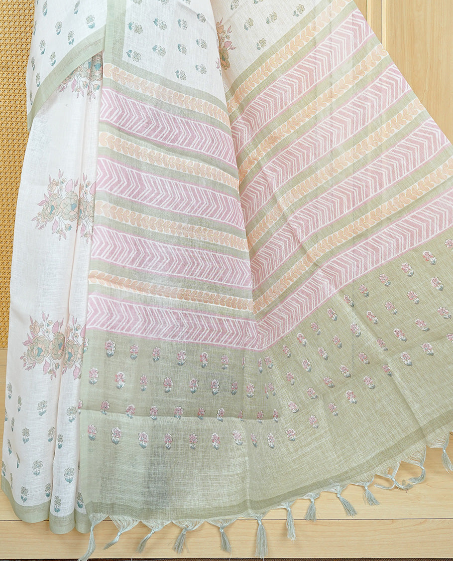 Cream colour semi linen saree featuring Light green colour floral print on body, complemented by contrast Light purple border, comes with matching blouse piece.