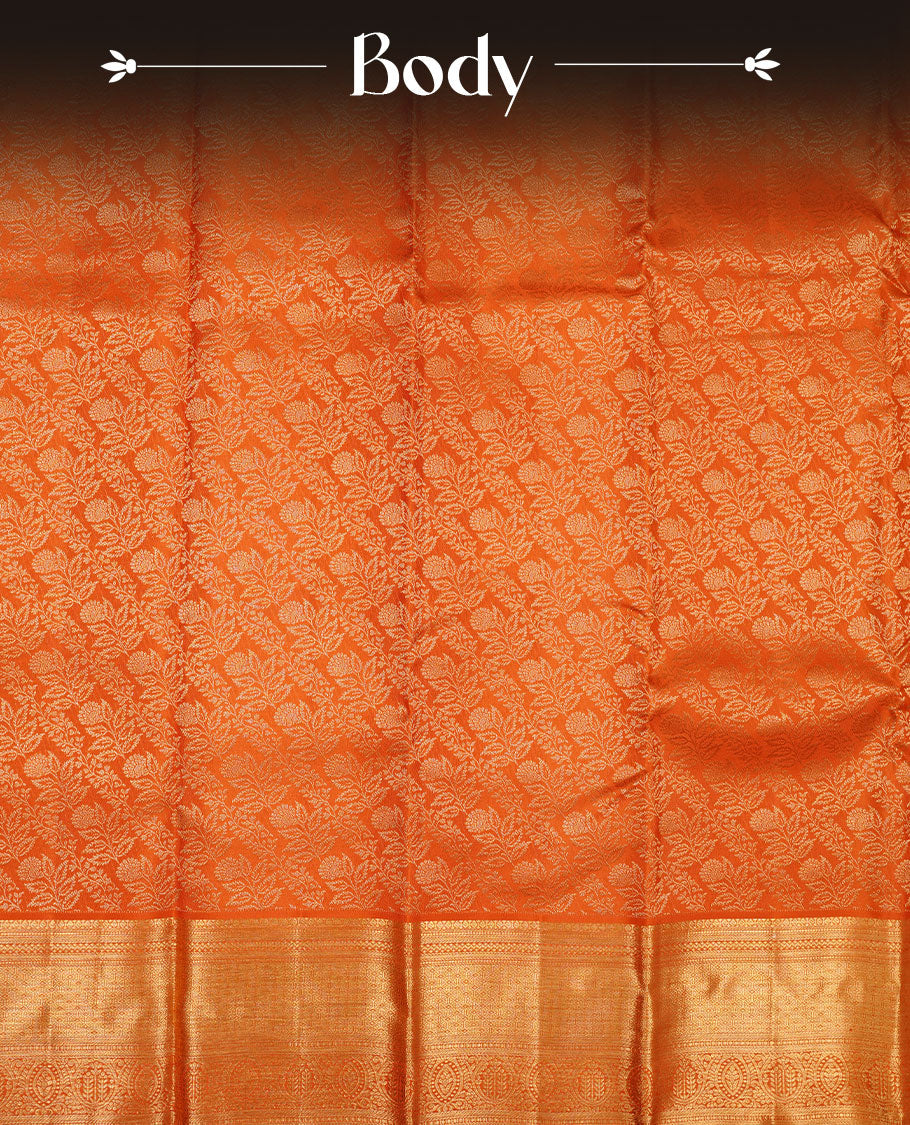 Orange colour kancheepuram silk saree featuring gold zari pattern across body, complemented by selfcolour border traditional zari border, paired with matching blouse piece.