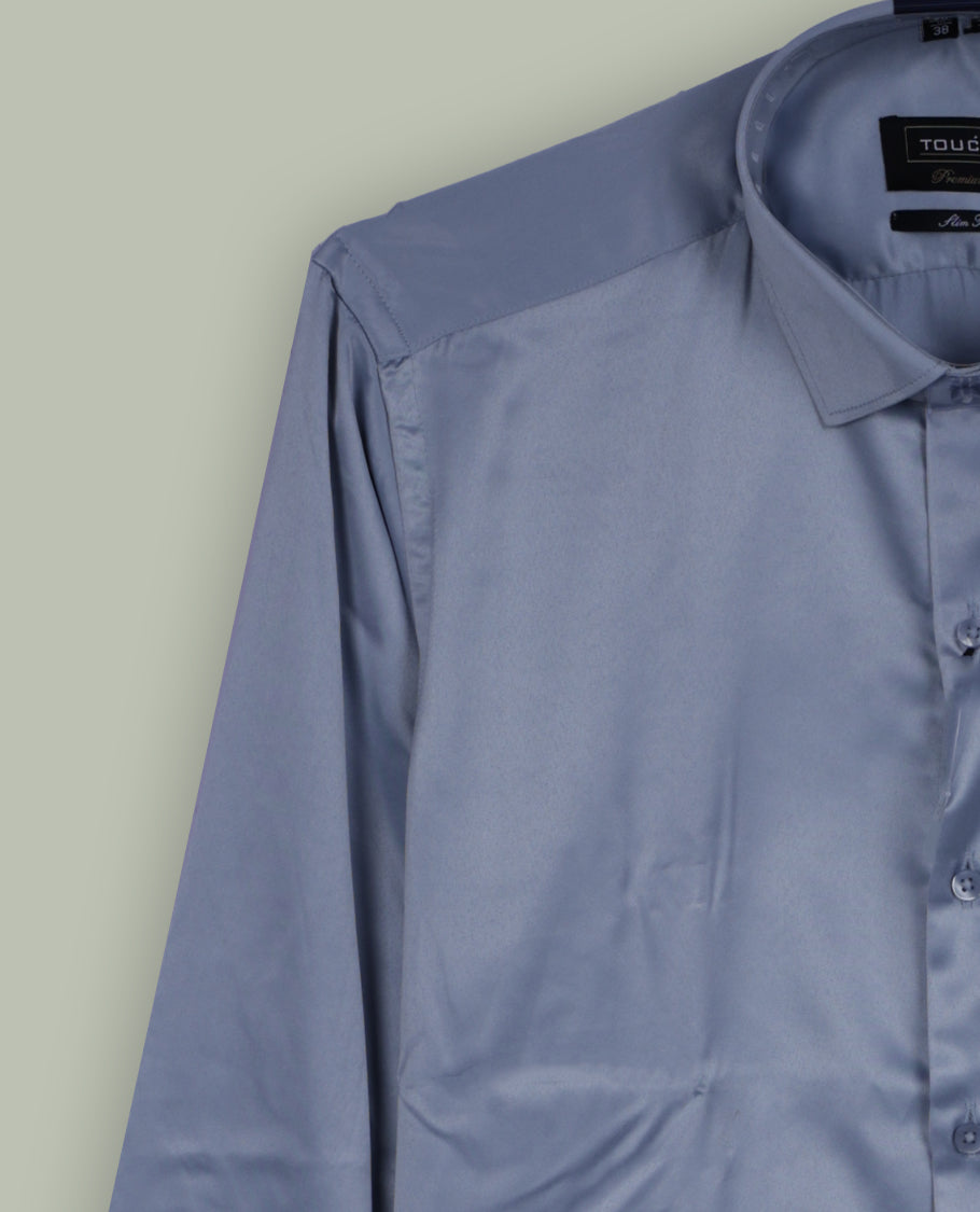 Pastel blue colour satin shirt with a smooth, lustrous finish. Features a classic collar, full sleeves with cuffs, and a front pocket & Perfect for evening wear or special occasions with a sleek, polished look.
