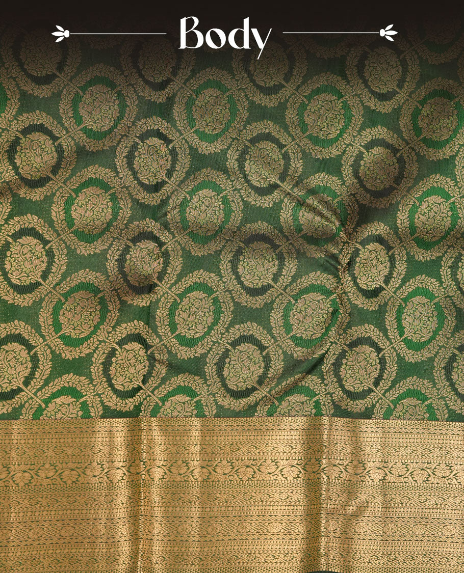 Bottle green colour kancheepuram silk sare featuring banaras floral zari jacquard on body with traditional border, paired iwth matching blouse piece.