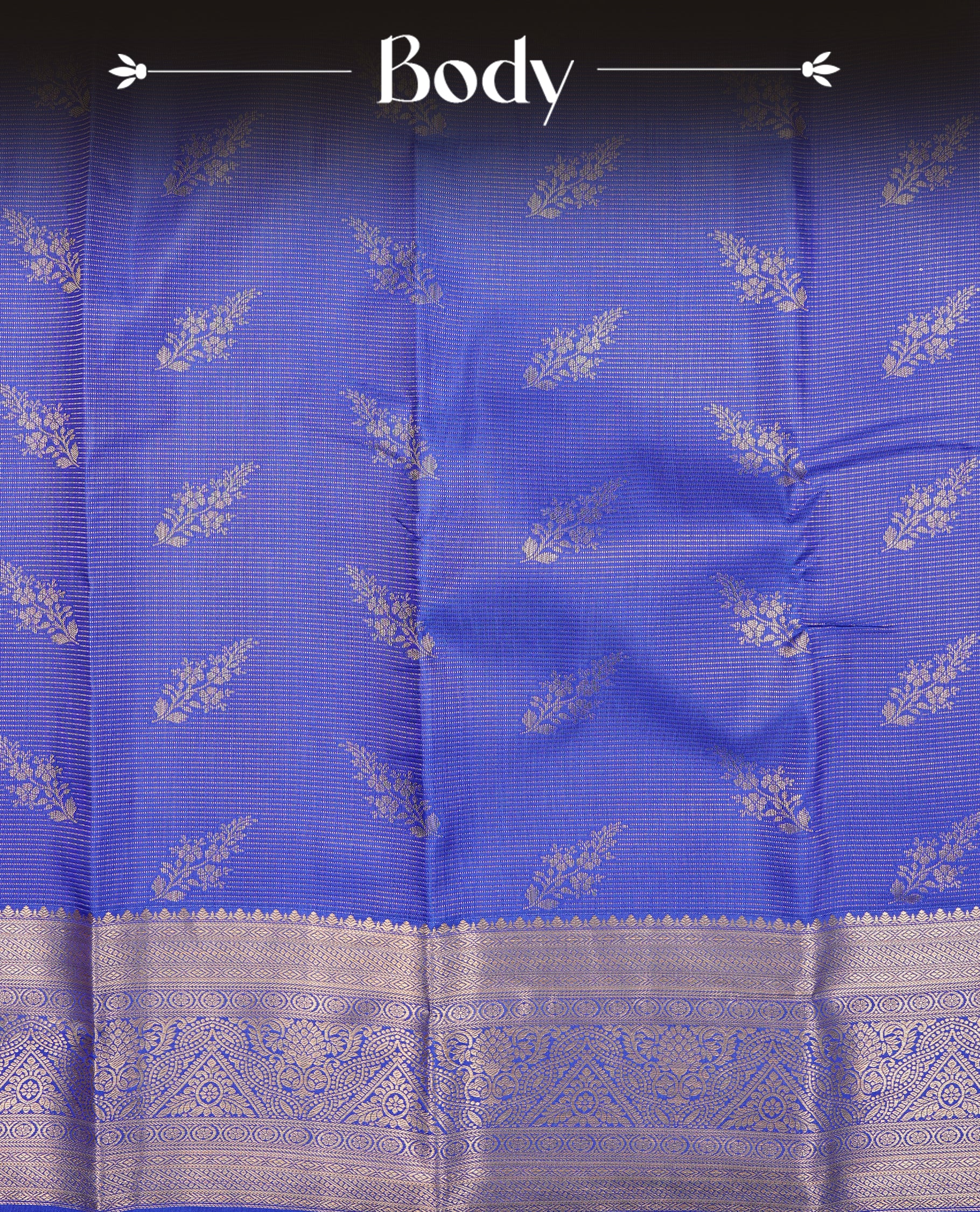 Blue Colour Semi Wedding Silk Saree Featuring Gold Zari stripes With Floral Buttas, Showcased with self colour With Traditional Border, Paired With Matching Blouse Piece.