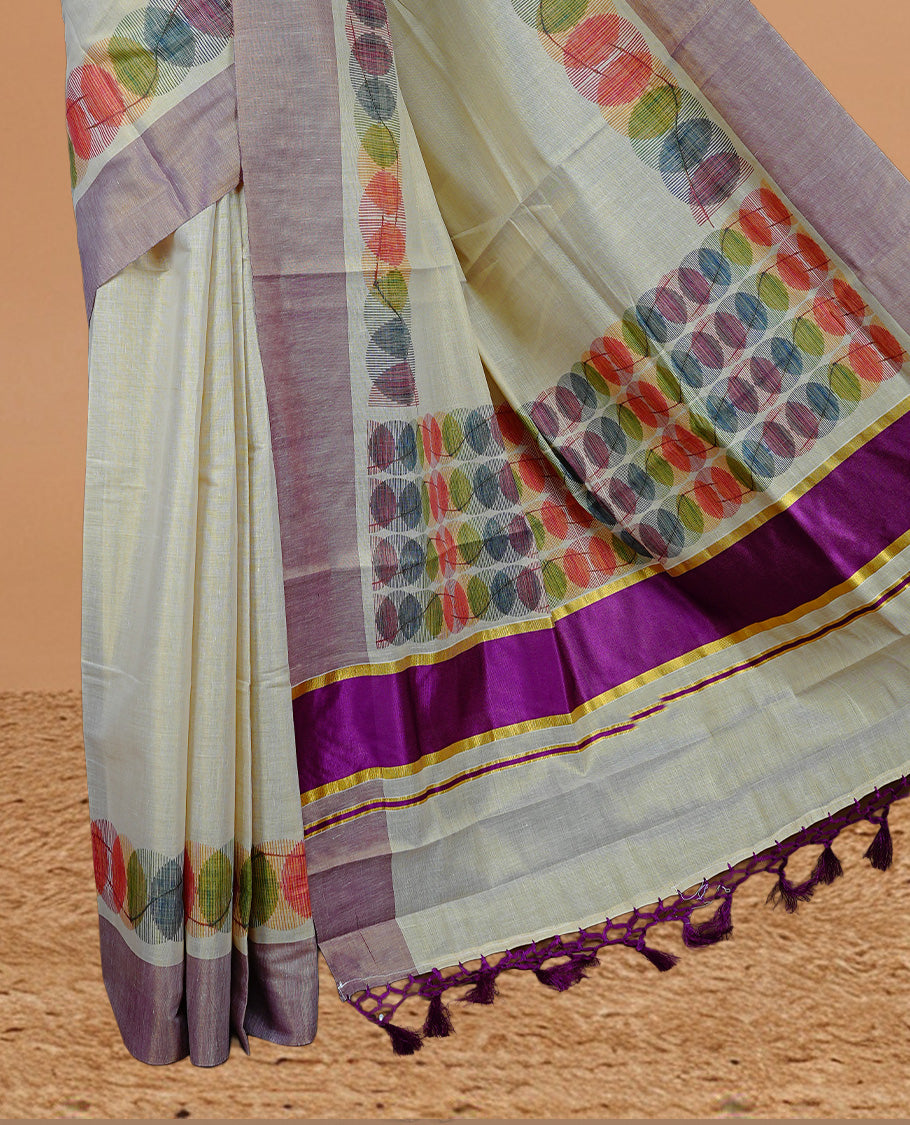 Cream Colour Tissue Kerala Saree Featuring Multicolour Circular Prints Along The Border And Pallu, Complemented By A Violet Border With Traditional Gold Zari Accents, Paired With A Matching Blouse Piece.