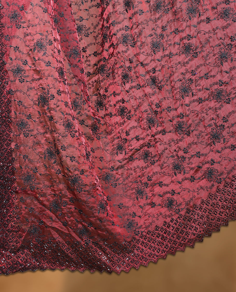Maroon colour velvet chiffon designer saree, featuring black thread embroidery kodi pattern on body, black cut stone work and heavy stone border, pallu and Paired with matching blouse.
