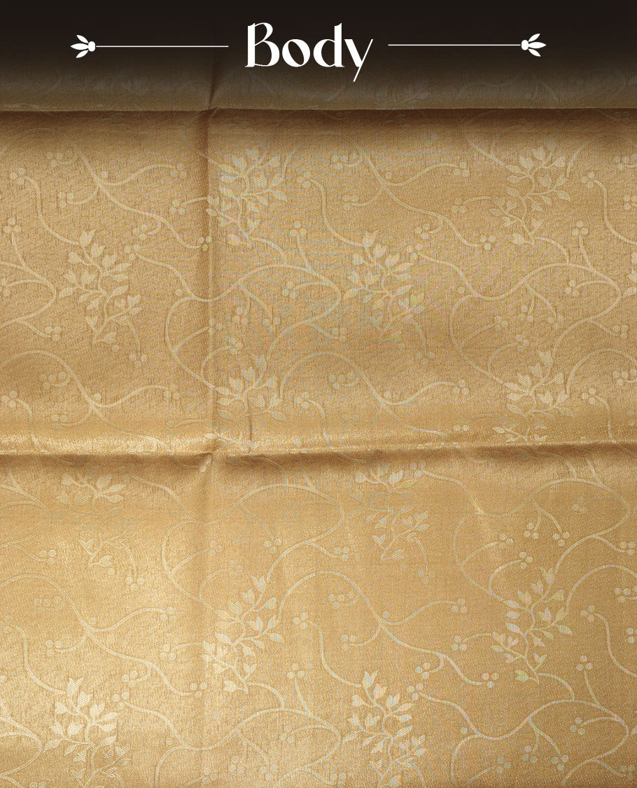 Gold colour semi tussar silk saree, featuring an intricate gold zari floral kodi pattern on the body and pallu, comes with matching blouse.