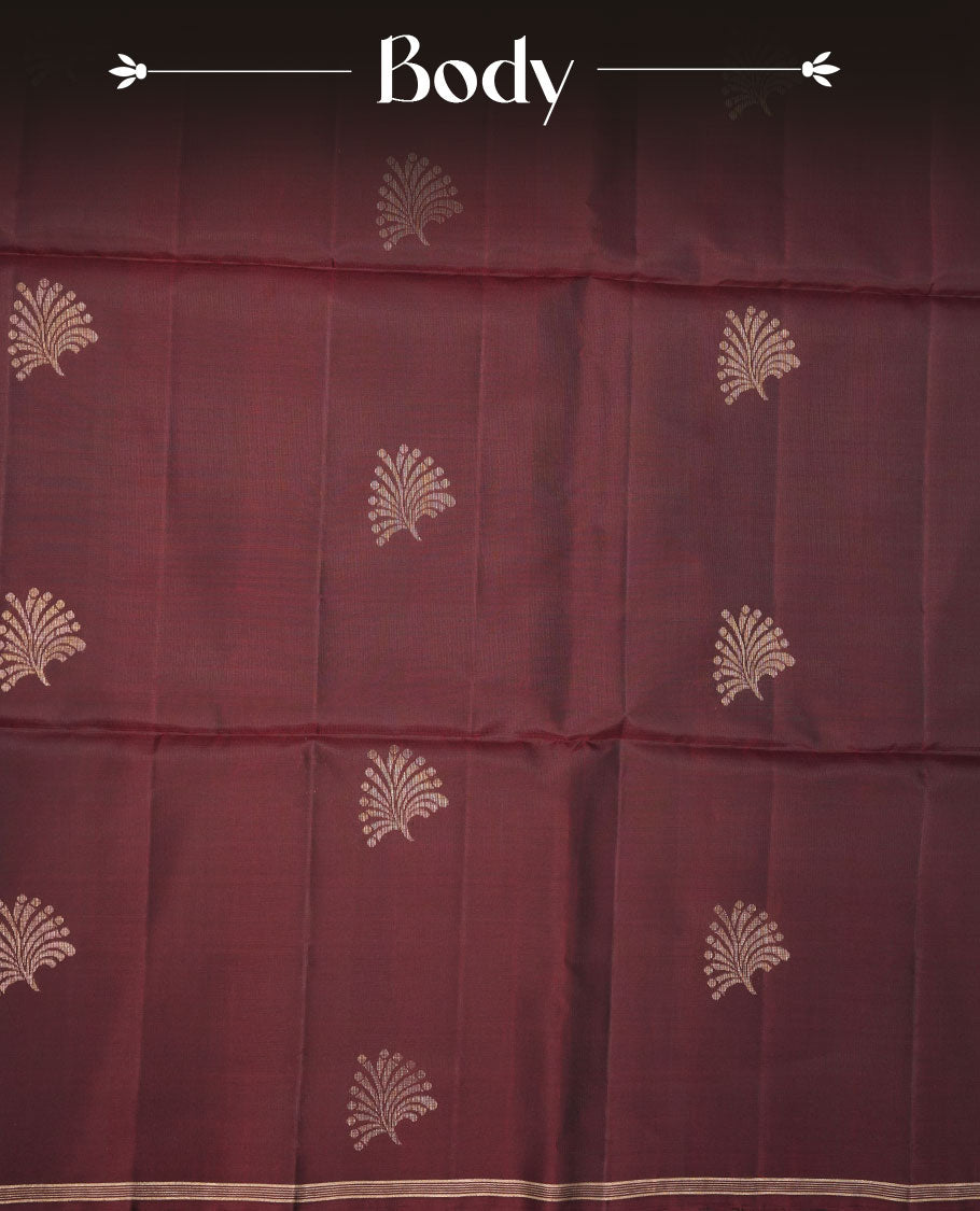 Chocolate Brown colour mayuri silk saree featuring gold zari motifs on body, complemented by self colour with traditional border with tassel at pallu, paired with matching blouse piece.