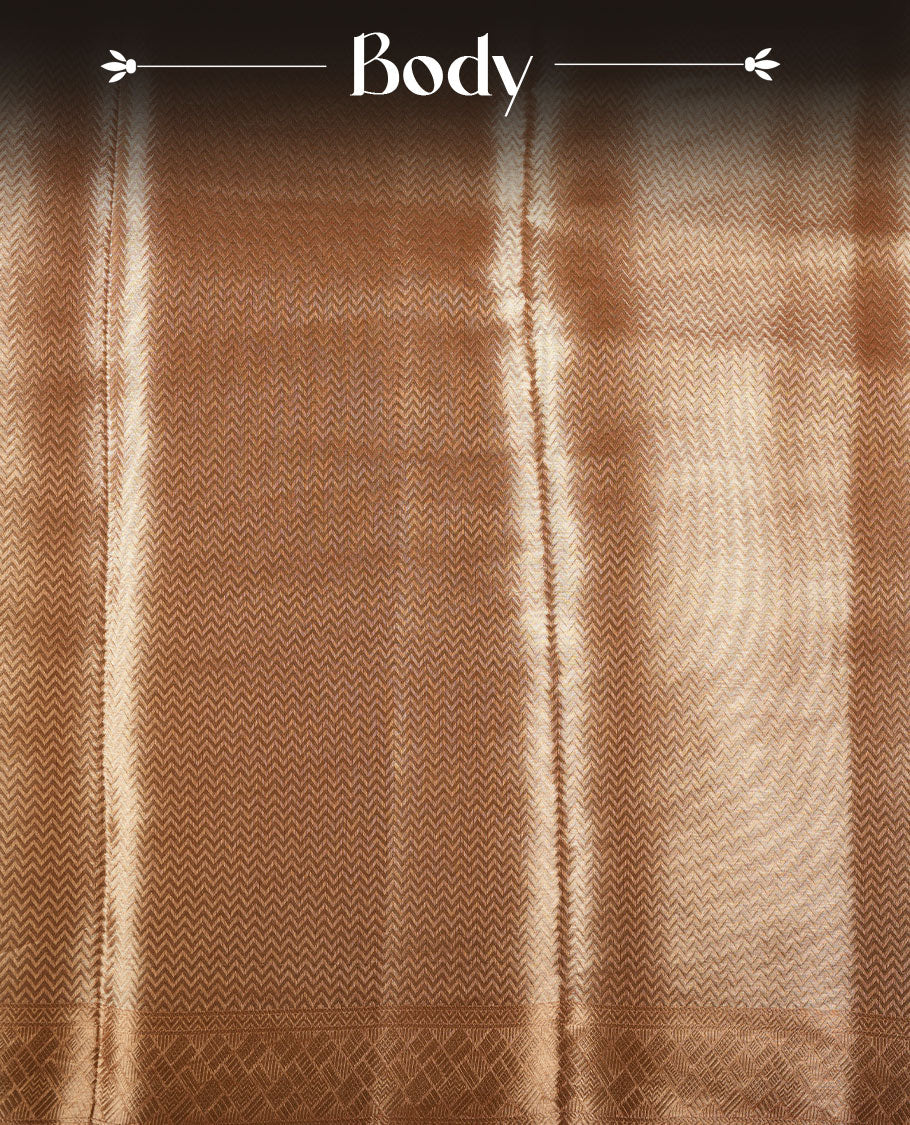 Dark Gold colour Pure banaras tissue silk saree featuring Silver zari brocade design across body, with contrast peach colour with gold zari brocade border, finished with a matching blouse.
