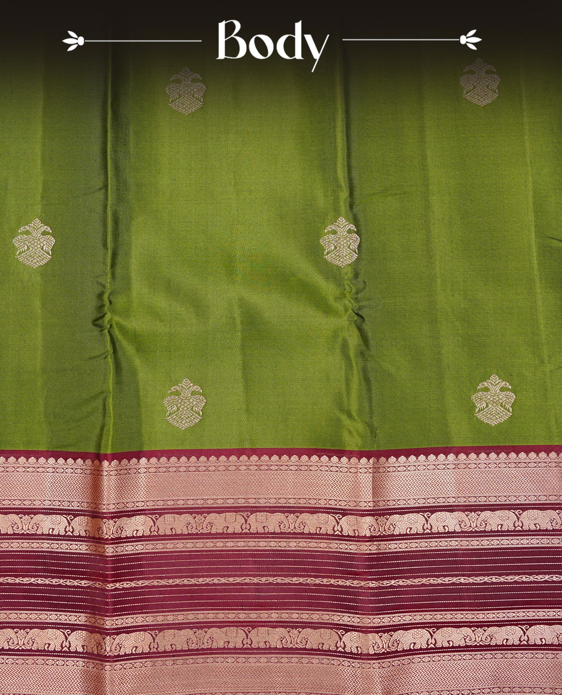 Olive Green Colour Kancheepuram silk saree featuring gold zari motifs on body, highlighting Gold zari Elephant Traditional On contrast Maroon border, paired with Matching blouse piece.