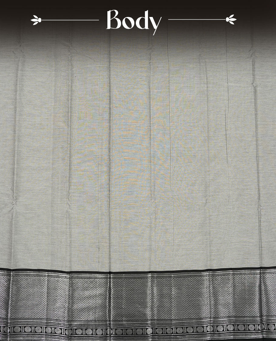 Gray colour Narayanapattu cotton saree featuring a self coloured body, contrast Black colour with silver zari border and pallu, pairing a matching blouse piece.
