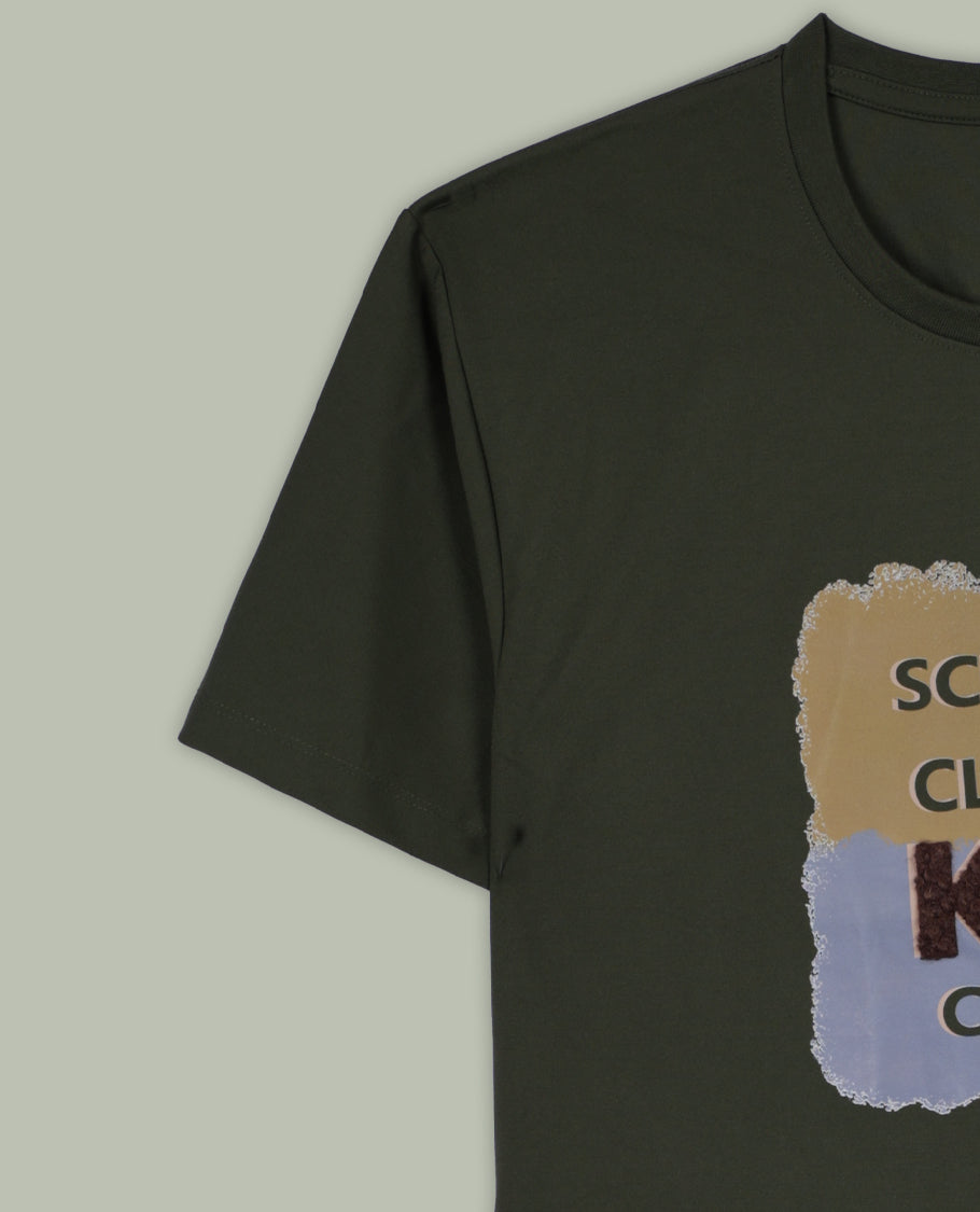 Dark olive green colour T shirt featuring a multicolour graphic print with a text & designed with a classic round neck and short sleeves,made from soft breathable fabric for a comfortable and stylish everyday look.