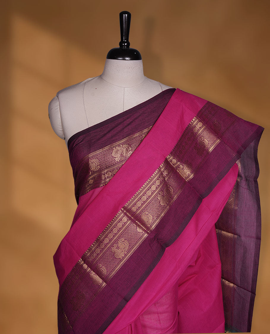 Rani Pink colour chettinad cotton saree featuring plain body, paired with a rich maroon traditional gold zari border without blouse.