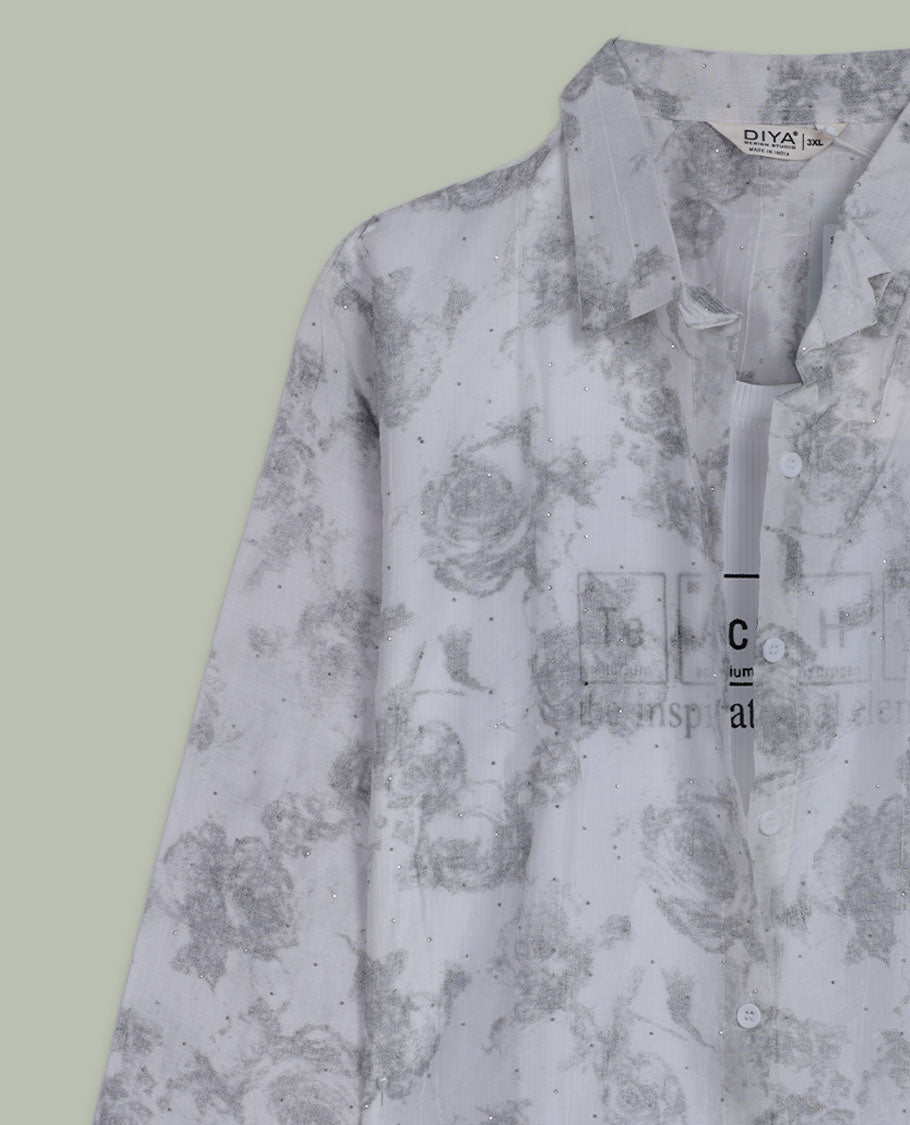 White longline floral printed shirt with collared neckline, full front button placket, long sleeves, and subtle all-over grey rose motifs.