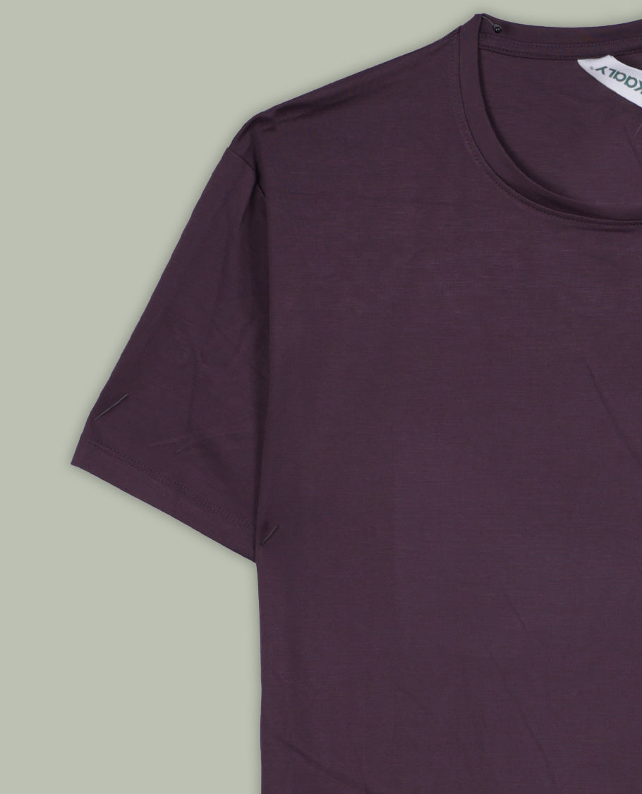 Deep purple colour T shirt featuring graphic print colour on the left & back , designed with a classic round neck and short sleeves & it offers a stylish and comfortable everyday look.