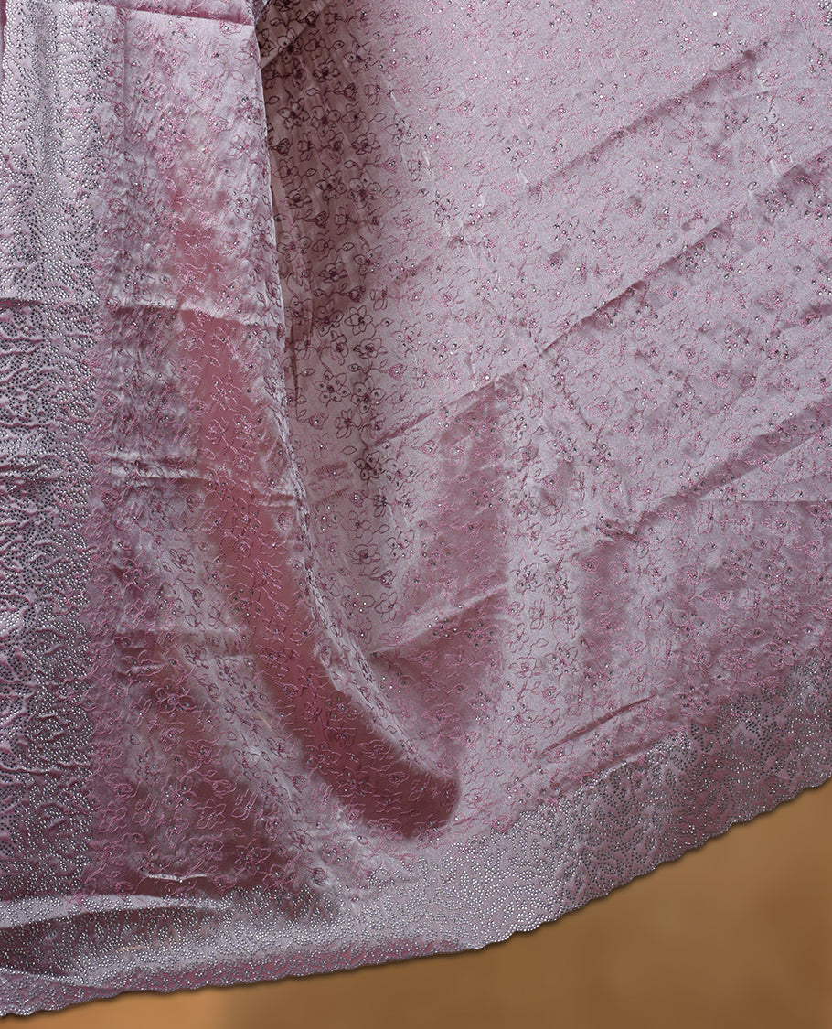 Dusty Pink colour velvet chiffon designer saree, featuring self colour thread embroidery kodi work on body, stone work and all over motifs on border and pallu, Paired with matching blouse.