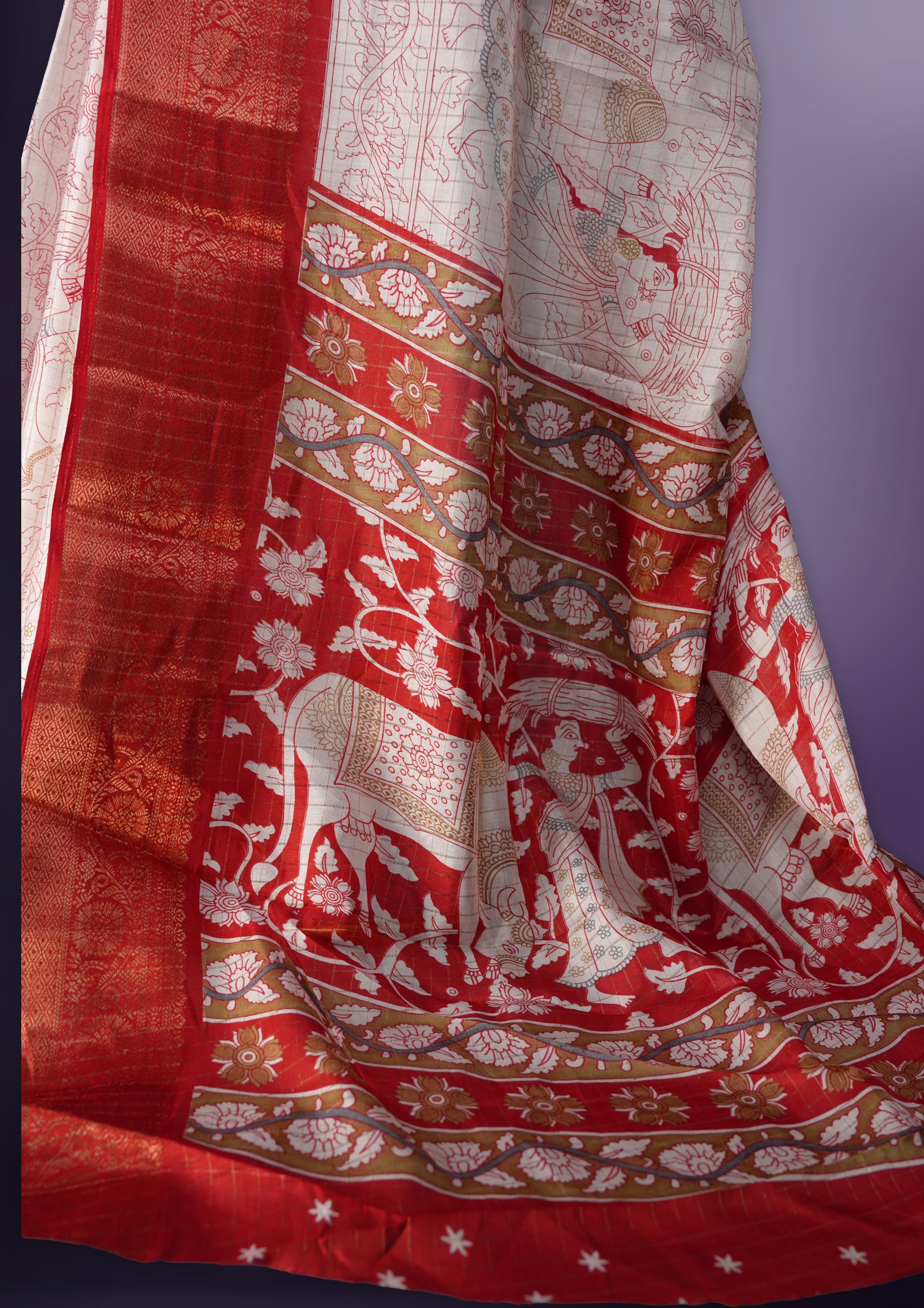 White saree adorned with red motifs, highlighted by a rich red zari border and pallu with traditional patterns and animal designs, paired with a matching blouse.