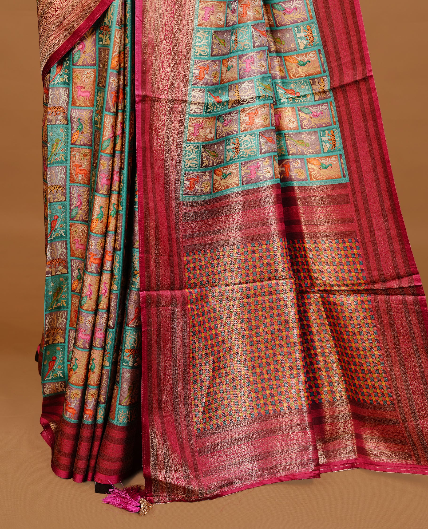 Sea Green colour Pashmina Saree featuring multicolour woven square motifs across the body, enhanced with a contrast magenta zari border and rich woven pallu, paired with a matching blouse piece.