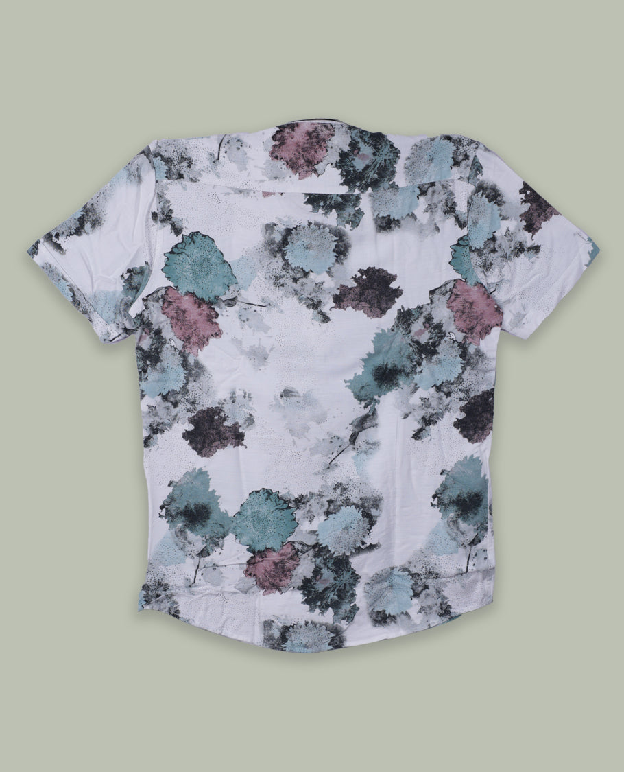 White colour short sleeve shirt features a rounded spread collar and a watercolor style floral print in teal, maroon, and black & its ideal for both casual days and laid back evenings.