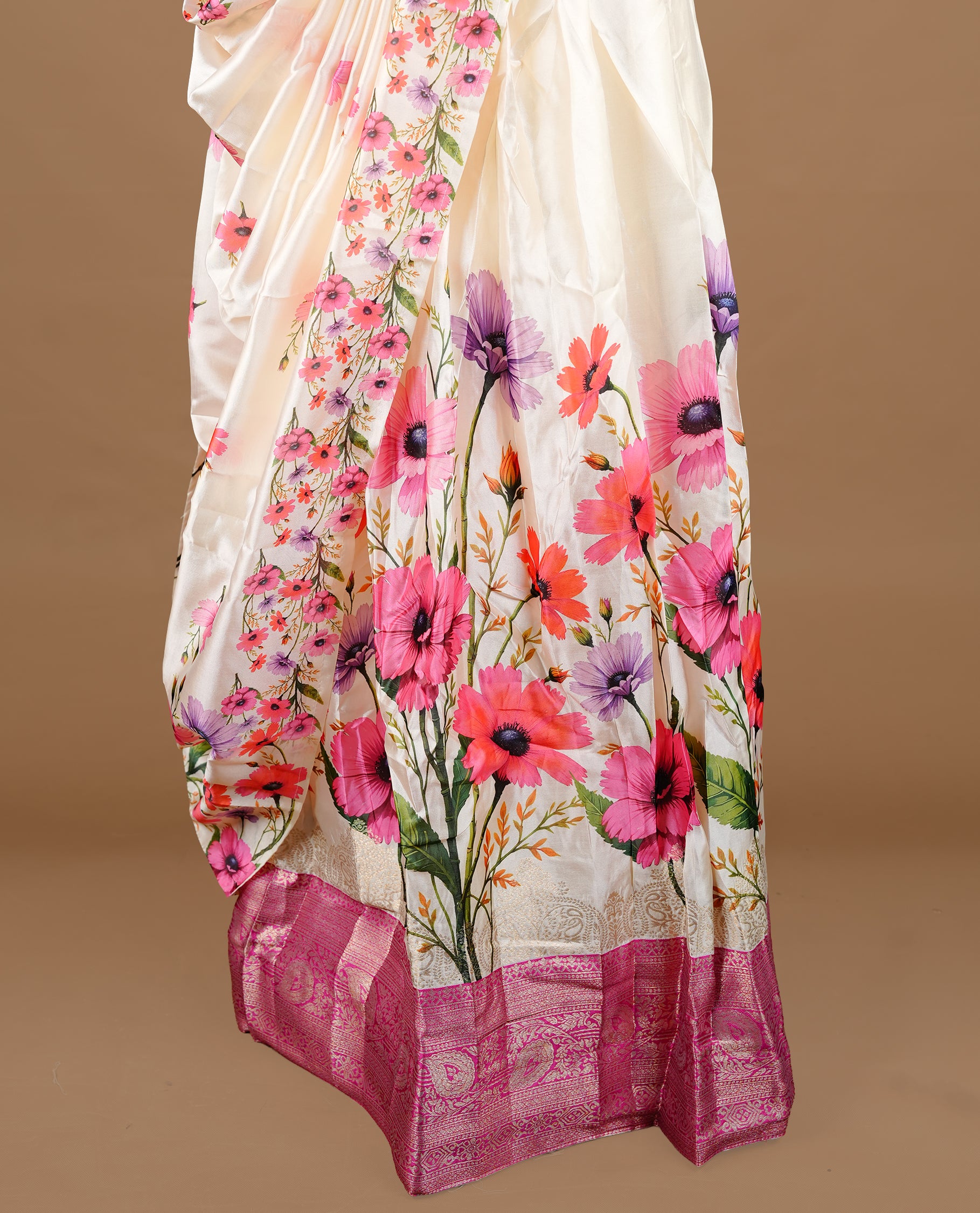 Off white colour semi stitched half saree featuring elegant Magenta colour floral prints, paired with a contrast Magenta with traditonal zari border and matching printed dupatta ,paired with matching blouse piece.