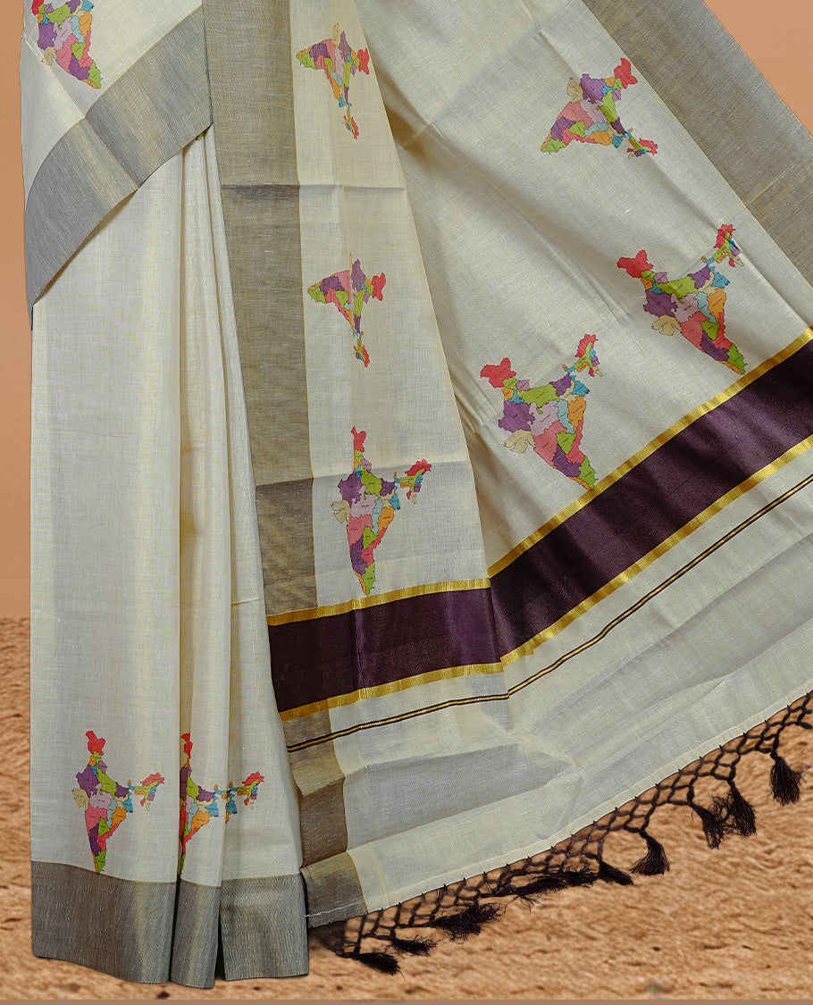 Cream Colour Kerala Saree Featuring Plain Body ,Complemented By A Burgundy Zari With Indian Map Border ,Enhance By A Gold Zari & Burgundy Pallu ,Paired With A Matching Blouse Piece.