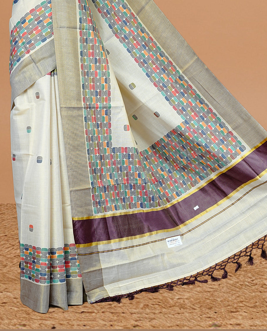 Cream colour Tissue kerala saree featuring Classy Multi colour Box pattern on body, Styled by Burgundy & gold zari border and pallu, comes with matching blouse piece.