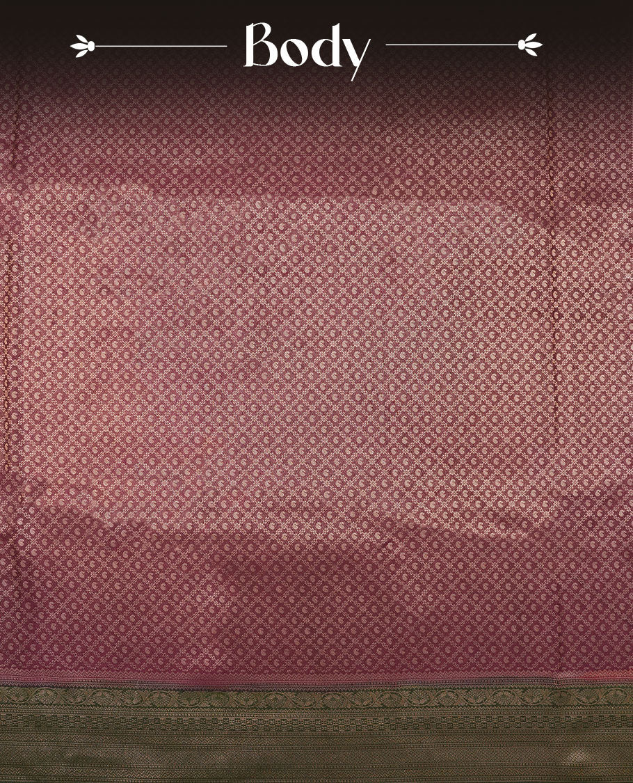 Grape Purple colour semi silk brocade saree featuring intricate Gold Floral kodi & leaf patterns across the body, complemented by a contrast green colour woven border and pallu, paired with a matching blouse.