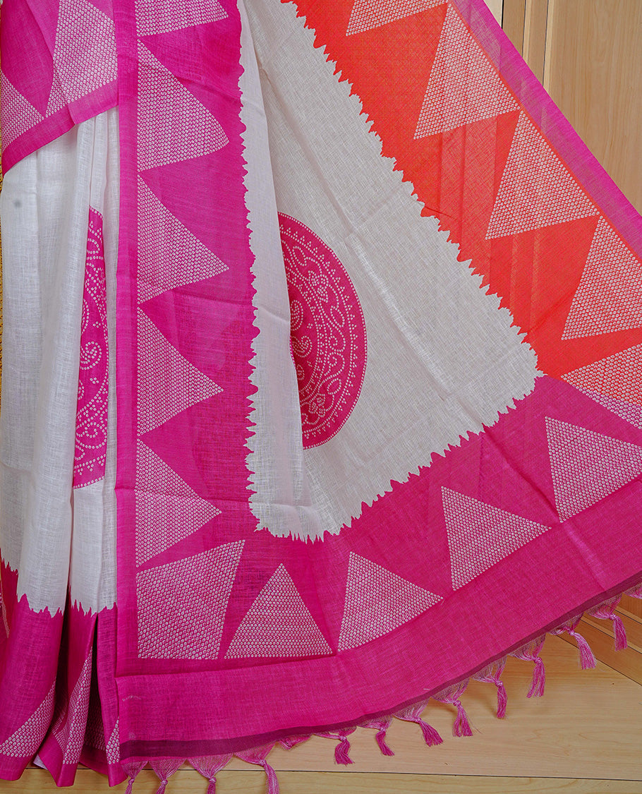 Cream colour semi linen saree featuring Pink Ajrakh pattern print on body, complemented by contrast Red colour with same pattern print Pink border, comes with matching blouse piece.