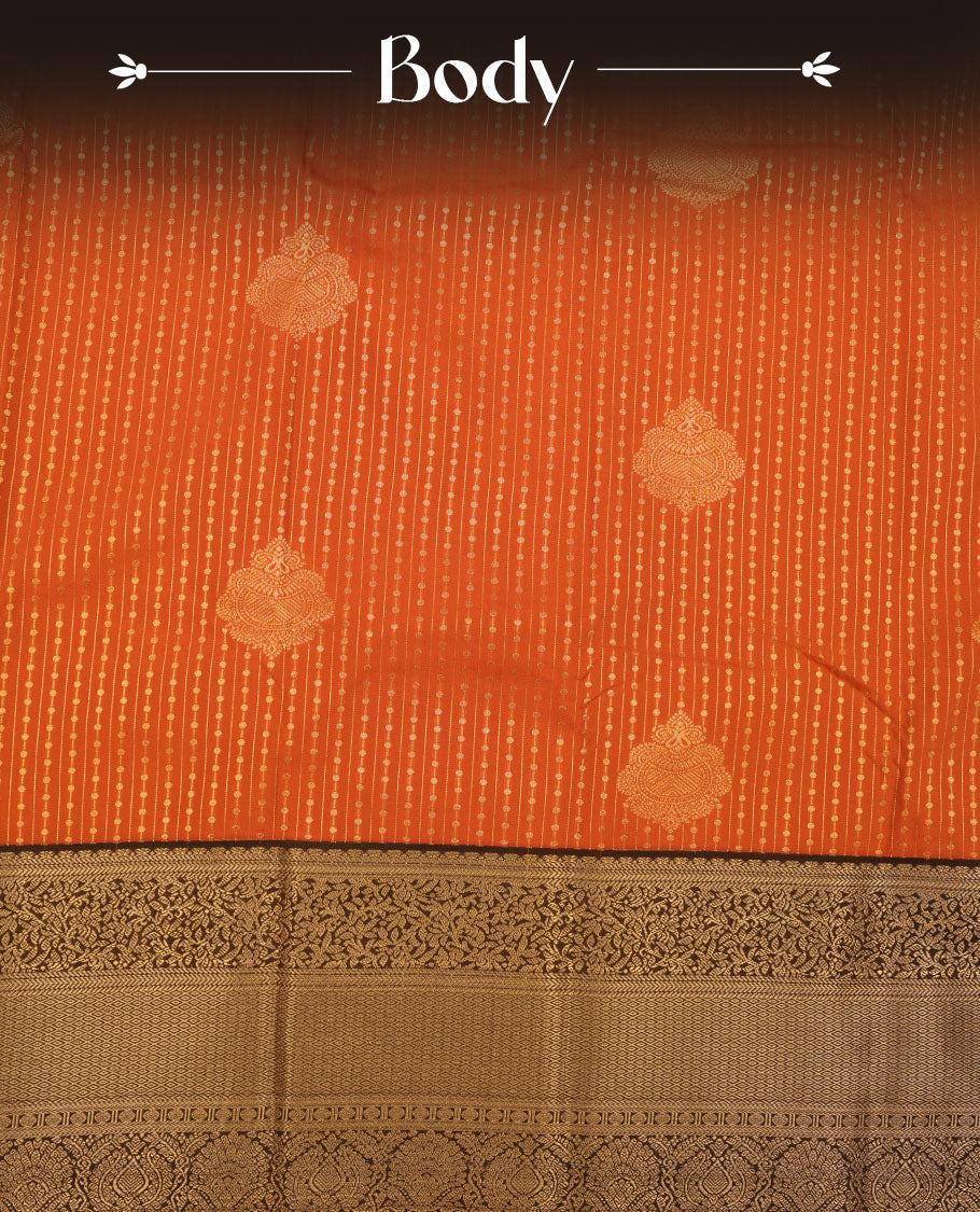 Rust orange colour semi silk saree featuring gold zari dotted stripes and stripes on body highlighting contrast dark chocolate gold zari floral kodi border , paired with matching blouse
