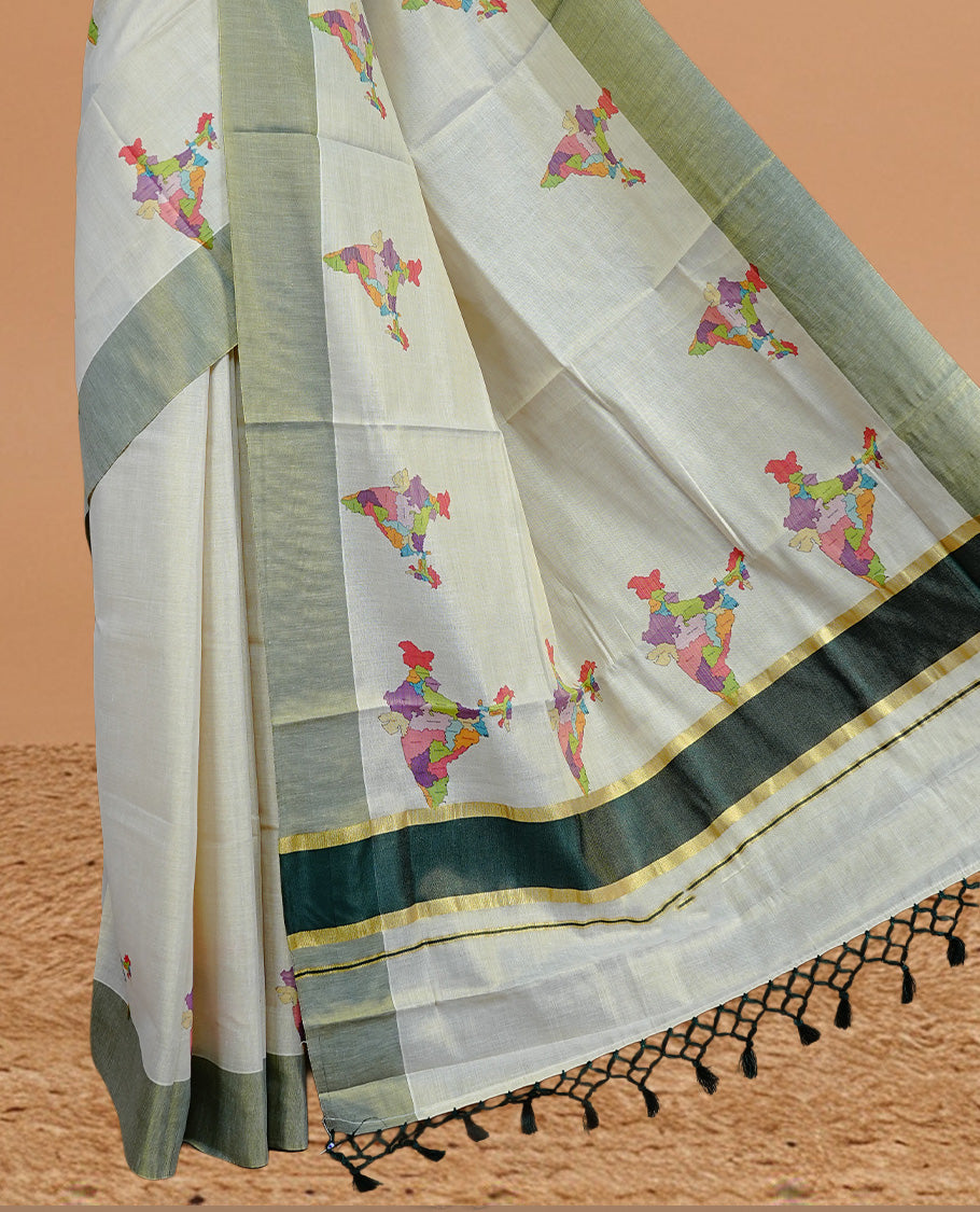 Cream Colour Kerala Saree Featuring Plain Body ,Complemented By A Green Zari With Indian Map Border ,Enhance By A Gold Zari & Green Pallu ,Paired With A Matching Blouse Piece.