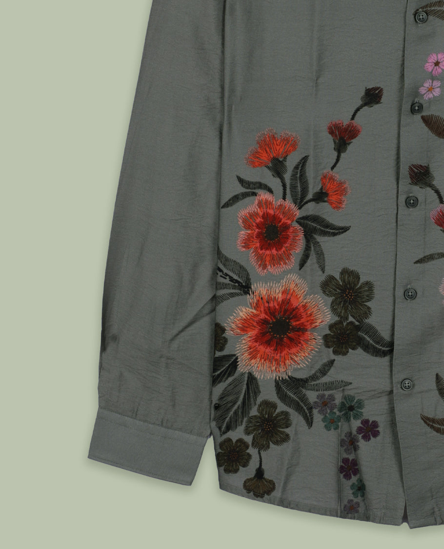 Grey colour full sleeve shirt features a rounded spread collar and a watercolor style floral print in orange, majenta, and green & its ideal for both casual days and laid back evenings.