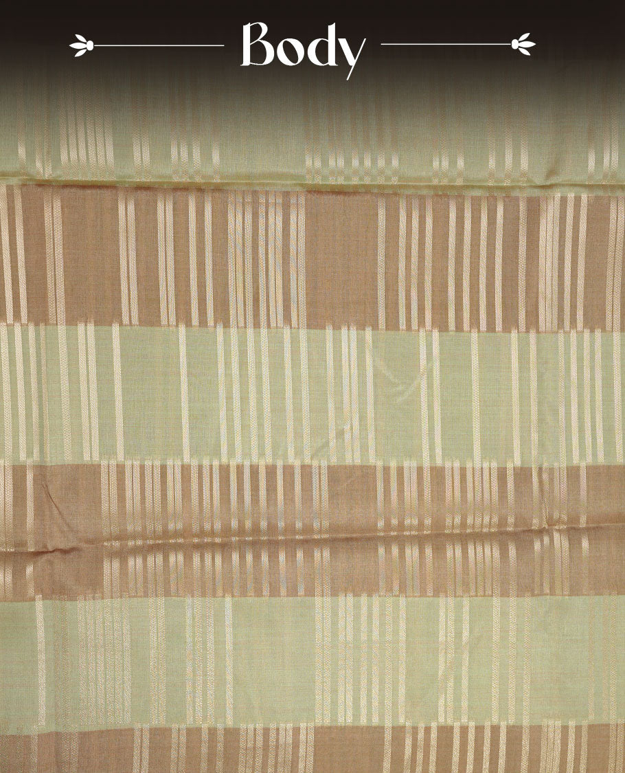 Mustard and pastel green colour semi tussar silk saree, featuring an intricate gold zari stripes on body and pallu , comes with matching blouse.