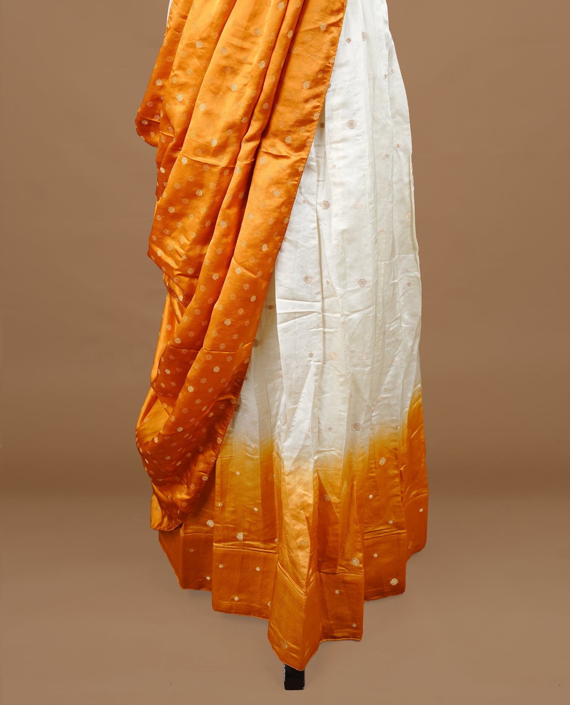 Off White colour half saree material featuring delicate zari buttas on the blouse and skirt, paired with a contrast Mustard zari border and matching zari motifs dupatta